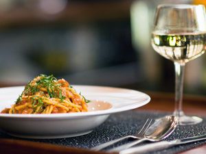 Pasta with a glass of white wine
