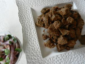 A plate of Turkish-style fried liver and onions