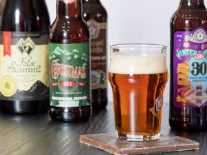 Assortment of winter beer and ales in glass and bottles