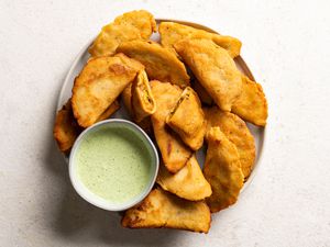 Colombian Empanadas: Fried Empanadas With Beef and Potato Filling on a platter