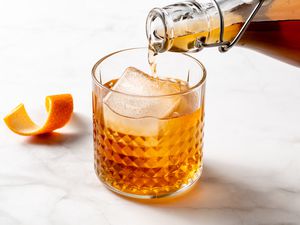 Homemade Amaretto Liqueur poured into a glass