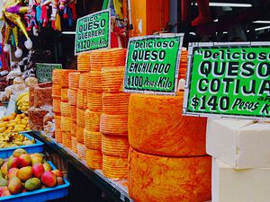 A stand of fresh Mexican cheeses