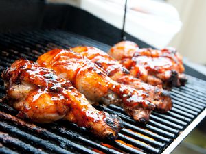 Barbecue chicken on grill