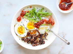 Instant pot congree in a bowl with egg and scallions