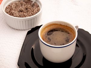 instant coffee mix and a cup of coffee