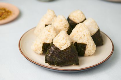 Karashi Mentaiko Onigiri (Spicy Cod Roe Rice Ball) on a plate 