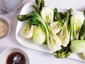 Roasted Bok Choy on a white platter 