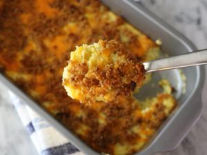 Squash casserole with cheese and breadcrumb topping