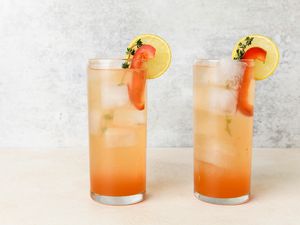 Sweet Pepper Spritzer Mocktails in glasses, garnished with lemon and pepper
