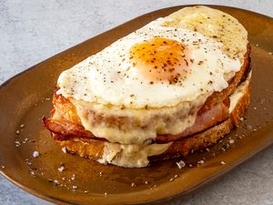 croque madame sandwich on a luncheon plate