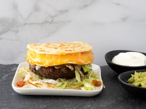 Quesadilla burger with extra cheese in the top bun